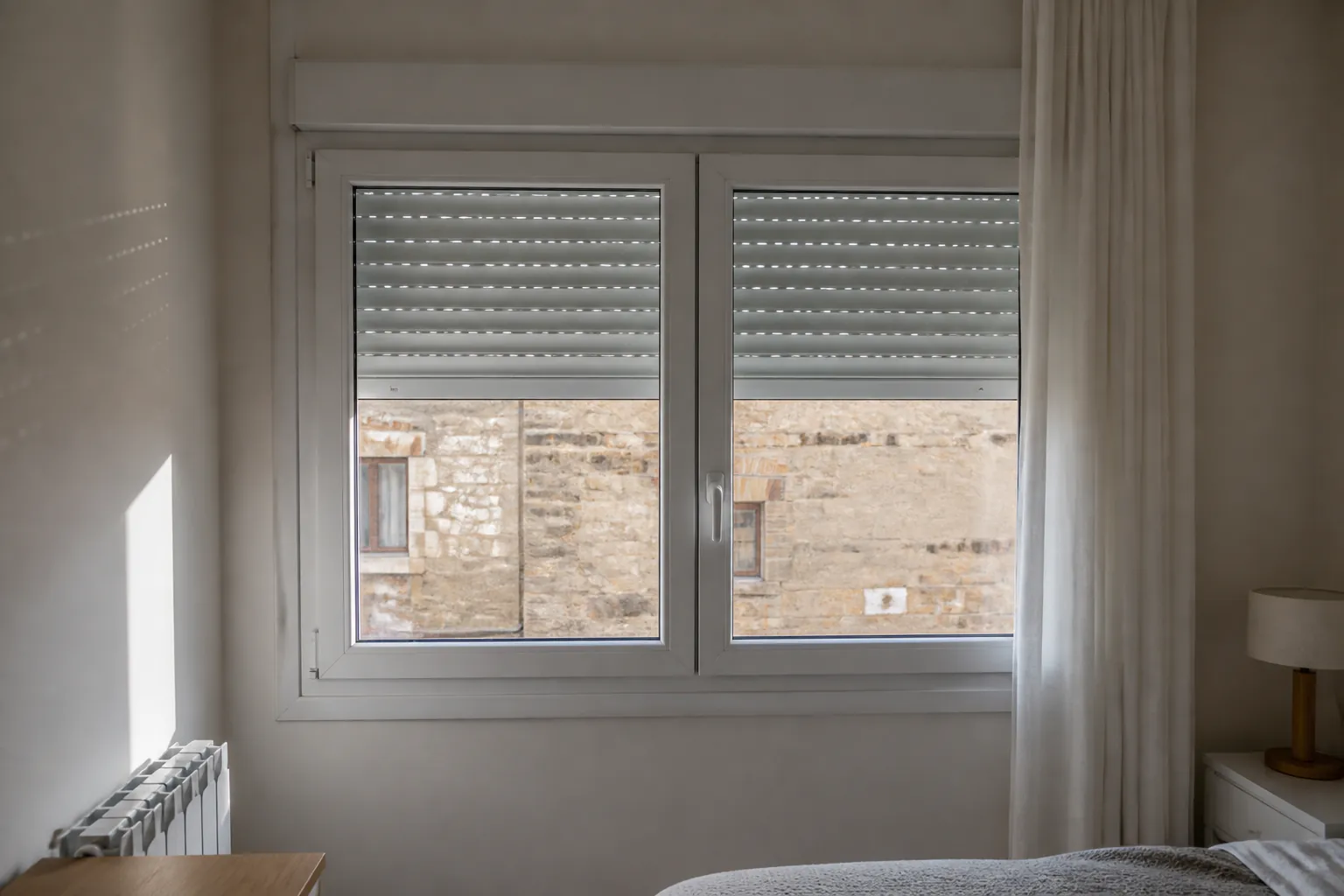 Ventana de PVC con persiana integrada en Cuenca
